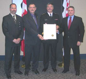 Reg Fountain, Wayne Douglas and Bill Soros, responsible for developing security criteria for the Vancouver 2010 Olympic and Paralympic Winter Games, received a Deputy Minister's Award in recognition of their contribution to help federal government departments achieve a comprehensive, whole-of-government approach to security.