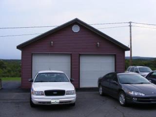 A photograph of a garage in Stellarton, Nova Scotia (Structure Number 151401)