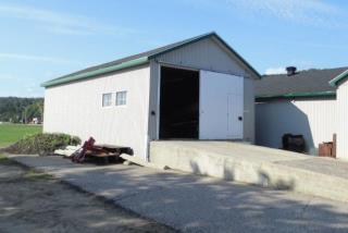 A photograph of a garage in Sault Island, Ontario (Structure Number 153637)