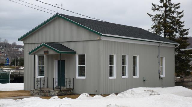 A photograph of the Timiskaming Dam Office, Ontario (Structure Number 031339)